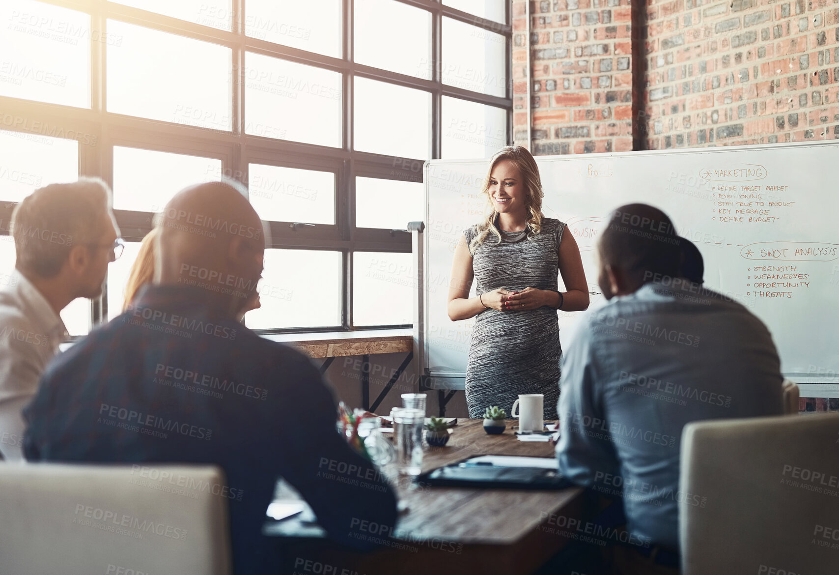 Buy stock photo Woman, presentation and meeting on whiteboard in office for feedback, planning and ideas of strategy development. Female presenter, leadership and workshop for coaching group of training kpi report