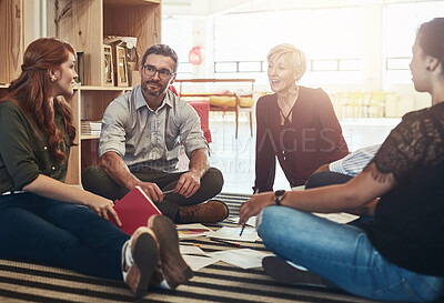 Buy stock photo Group, circle or business people sitting on floor for collaboration, documents and notes for ideas. Teamwork, huddle or meeting with manager for company plan, discussion for strategy in office