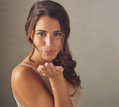 Buy stock photo Beauty, portrait and woman blow kiss for skincare, natural and cosmetic facial treatment. Flirting, health and female person with dermatology routine for wellness isolated by studio background.