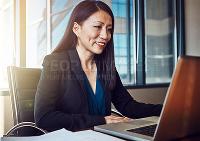 Buy stock photo Japanese lawyer, woman and laptop for reading, review or smile for legal report by documents in office. Attorney, advocate or person by computer, web or research for compliance at corporate law firm