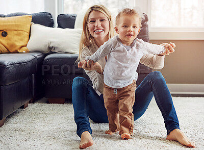 Buy stock photo Baby, mother and development in house with walking or growth of child for first steps in portrait. Toddler, woman and motor skills with support, help and learning from mom for progress or balance