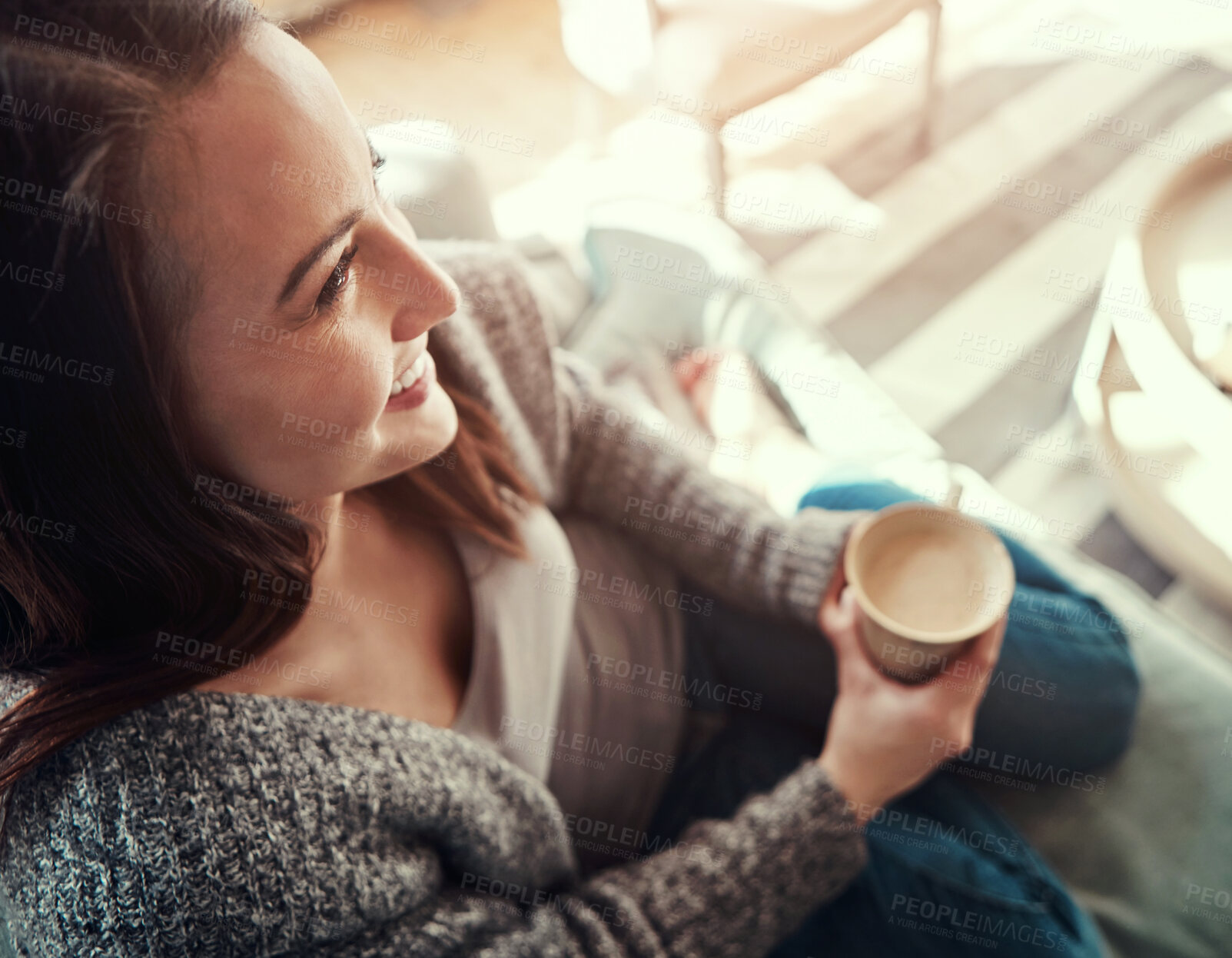 Buy stock photo Happy woman, morning and sofa with coffee above for drink, caffeine or relax in living room at home. Top view of female person with smile for beverage, cappuccino or latte on lounge couch at house