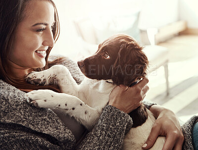 Buy stock photo Smile, woman and dog with love at house, adoption and bonding for care by support of animal relax on sofa. Happy, pet owner and puppy friends for wellness, hug or loyalty together at family home