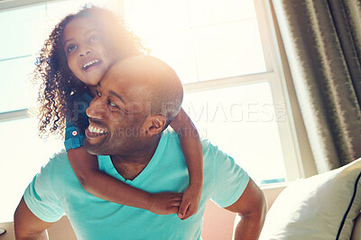 Buy stock photo Black family, home and father with girl for piggyback, relationship trust and support for fun. Hug, smile and African papa carry child with playing together for development and happiness in lounge