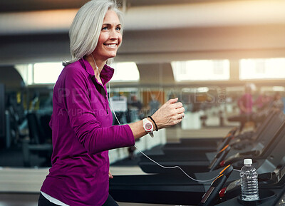 Buy stock photo Gym, headphones and senior woman on treadmill with thinking for exercise, training and podcast. Happy, person and smile with workout in retirement for cardiovascular, health and listening to music