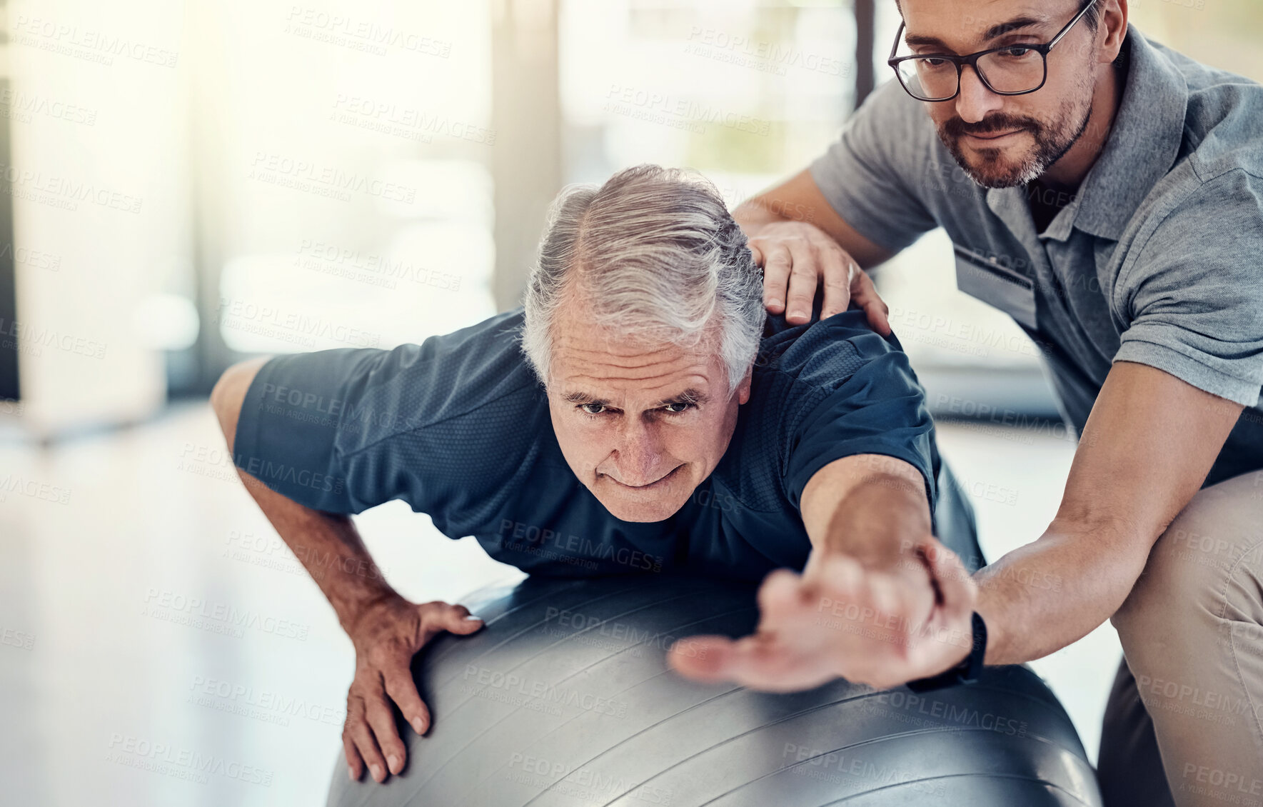 Buy stock photo Stretching, physiotherapist and old man with gym ball, clinic and medical help in senior rehabilitation. Physio, therapist and elderly patient for mobility training, exercise or support in retirement