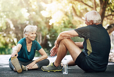 Buy stock photo Senior man, woman and stretching exercise on road for fitness, discussion for retirement with smile. Mature couple, workout and together for happiness on street, outdoor with chat in neighborhood