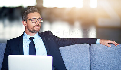 Buy stock photo Business, man and thinking on sofa with laptop in office, pensive and vision for online website or thoughtful on couch. Professional, career and corporate with tech, internet report and project idea