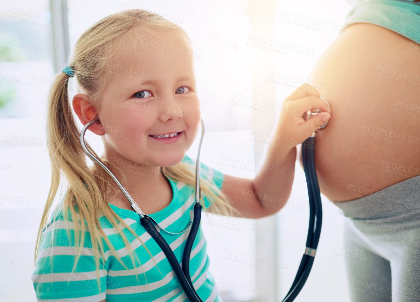 Buy stock photo Stethoscope, smile and child with pregnant mother listening to heartbeat of baby for doctor role play. Happy, portrait and girl kid with medical equipment on belly of mom for prenatal checkup at home