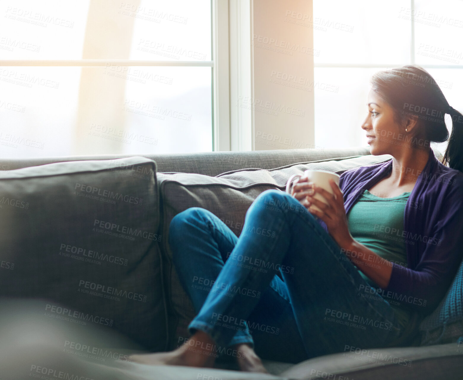 Buy stock photo Thinking, drinking coffee and Indian woman relax in home living room for morning breakfast, latte and espresso. Tea, dream and person on sofa for peace, calm and planning future decision in house