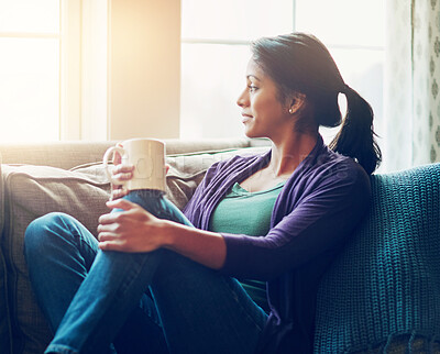 Buy stock photo Thinking, drinking coffee and Indian woman in house living room for morning breakfast, vision or remember. Tea, dream and person on sofa for peace, calm and planning future decision in home to rest