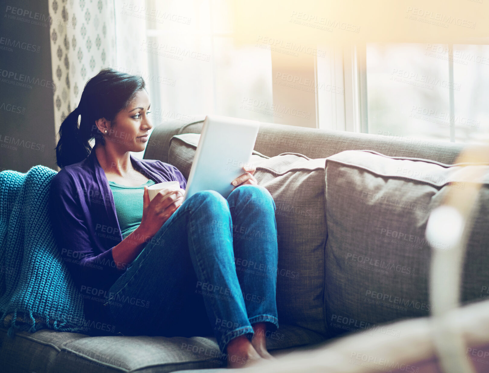 Buy stock photo Coffee, thinking and woman with tablet on a sofa for calm, reflection and relax with social media, streaming or service at home. Digital, memory and girl person with tea a in living room with ebook