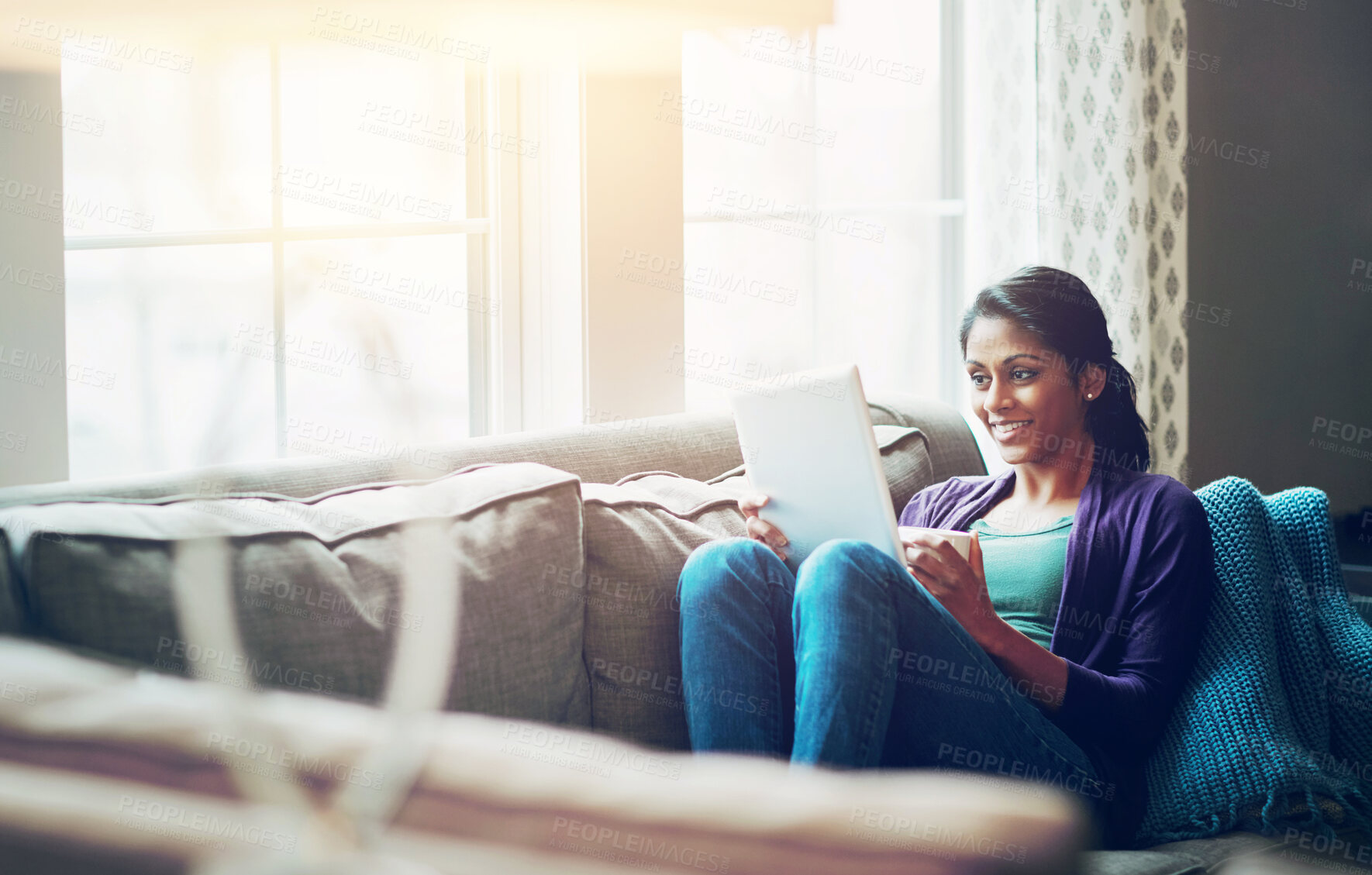 Buy stock photo Woman, house and reading tablet for relax on sofa, scroll on internet or social media. Female person, mobile technology and living room with research and happiness, online blog or email communication