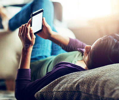 Buy stock photo Woman, phone screen and lying on sofa with blank space for mockup, reading and app in living room. Girl, smartphone and streaming with ux for notification, video and relax on couch with social media