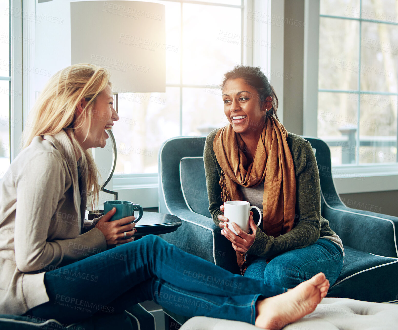 Buy stock photo Relax, talking and women on sofa with coffee for conversation, socialising or bonding in living room. Gossip, speaking and happy people with cup for communication, memories or funny story in home