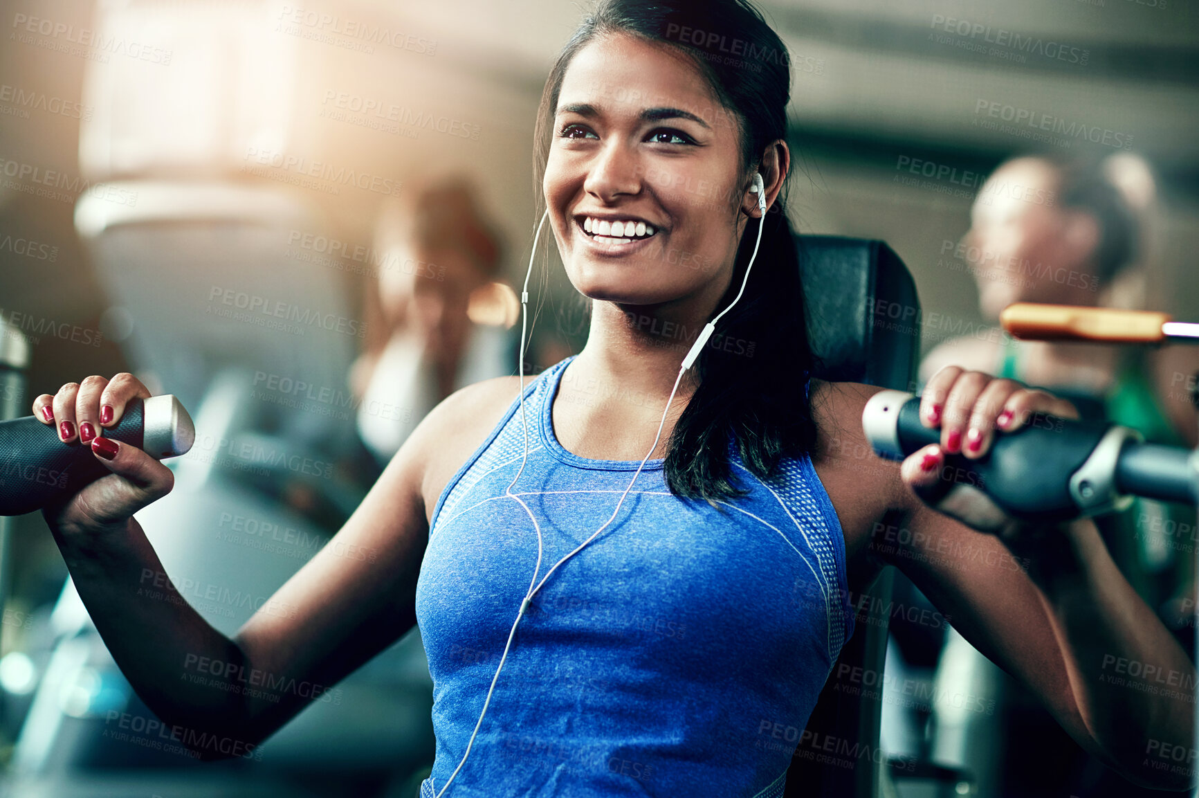 Buy stock photo Gym, woman and happy on chest press machine for workout to exercise for health, fitness and muscles. Female person, smile and satisfied with training for wellbeing, wellness and self care in routine