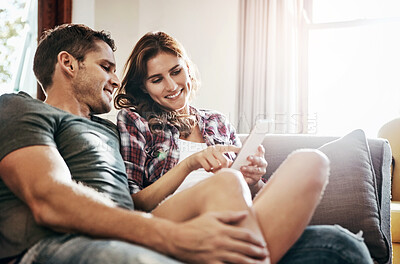 Buy stock photo App, phone and relax with couple on sofa in living room of home together for communication or social media. Break, love or smile with happy man and woman in apartment for browsing or networking