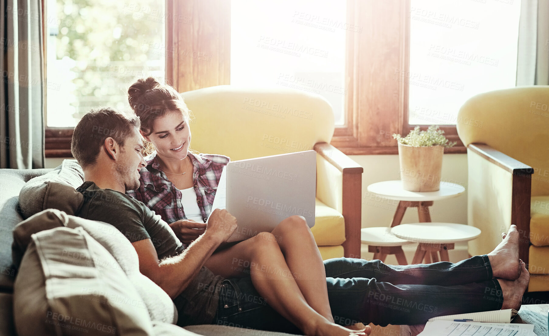 Buy stock photo Happy couple, laptop and relax on sofa for budget, planning and savings account for personal debt. Man, woman and together on couch with computer for expenses, tax and loan payment in living room