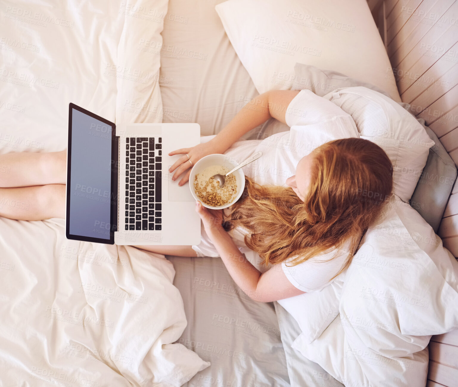 Buy stock photo Top view, hands and typing on laptop on bed with breakfast, social media and web browsing in the morning. Technology, remote worker and woman at home on project, writing email or research on computer