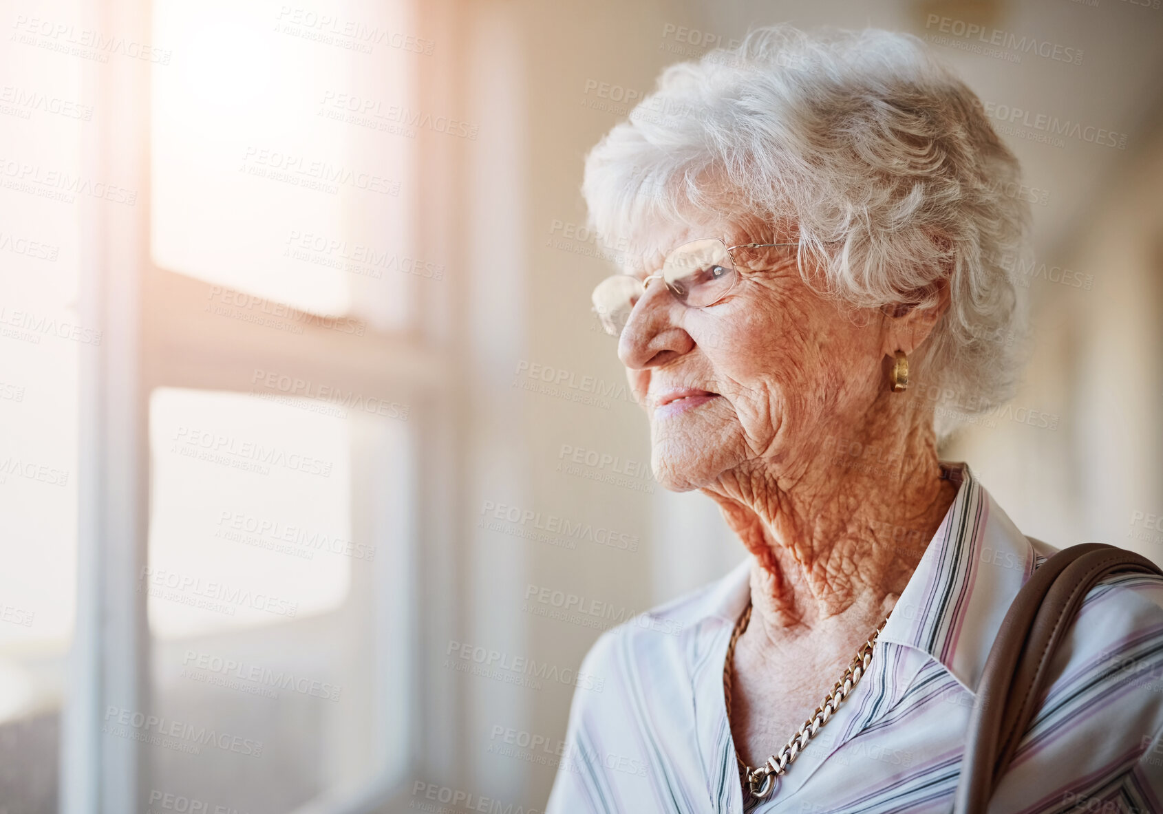 Buy stock photo Senior woman, thinking and window in house with smile for memory, choice and reflection in retirement. Elderly person, remember and ideas with decision, insight and perspective at nursing home