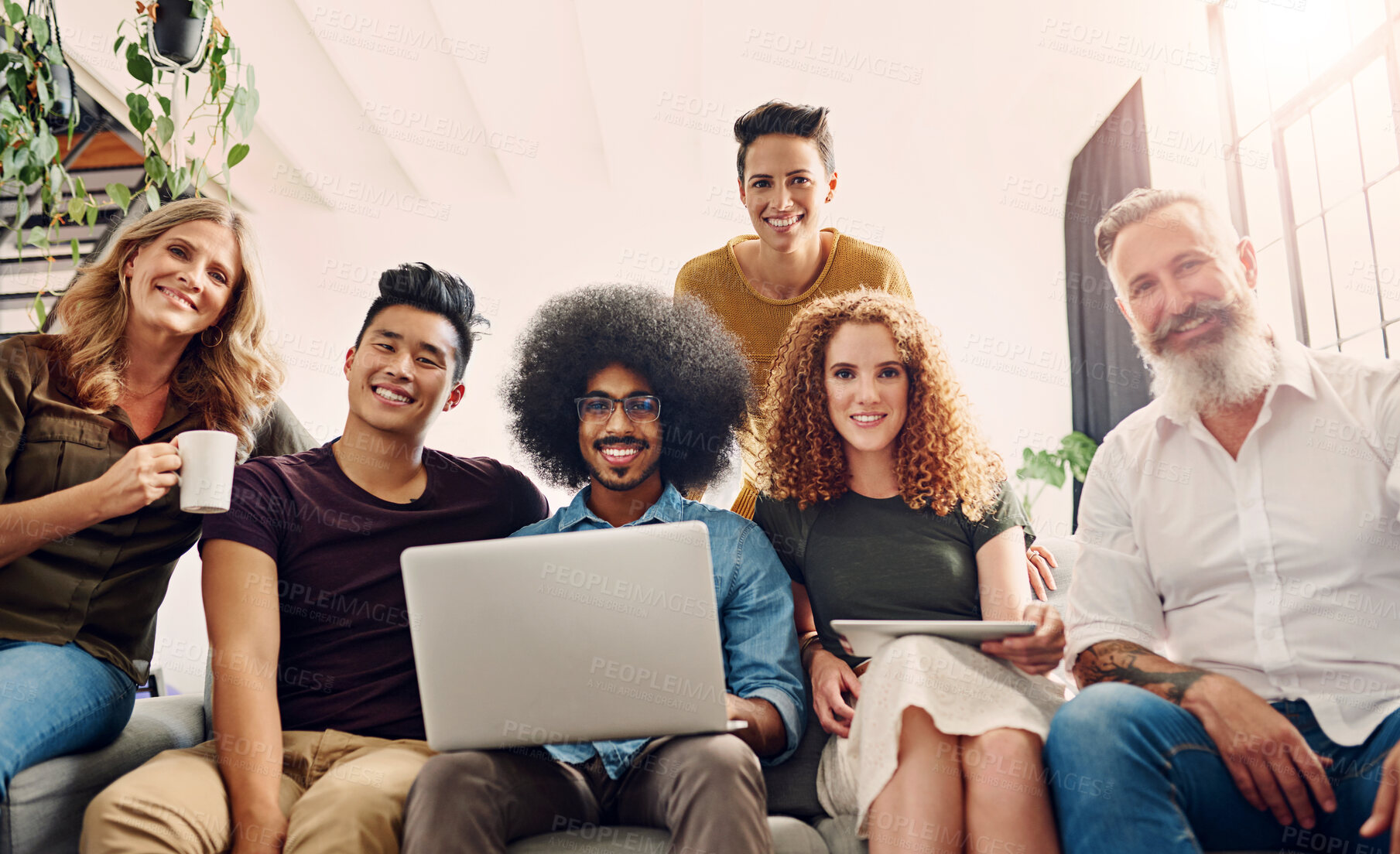 Buy stock photo Business people, group and portrait with laptop in office for meeting, collaboration and project research. Low angle, creative team and diversity with multimedia for software development in company