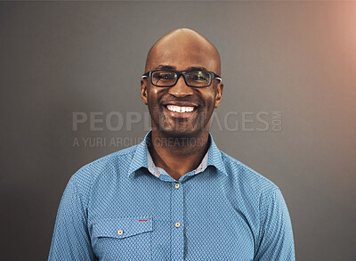 Buy stock photo Smile, designer or portrait of black man in studio with pride, business and confidence for fashion. Startup, person or happy African entrepreneur with shirt or glasses isolated on grey background