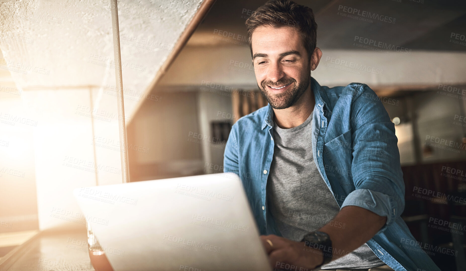 Buy stock photo Happy man, freelancer and remote work with laptop at cafe for communication, research or email. Male person or creative employee with smile on computer for online startup at indoor restaurant