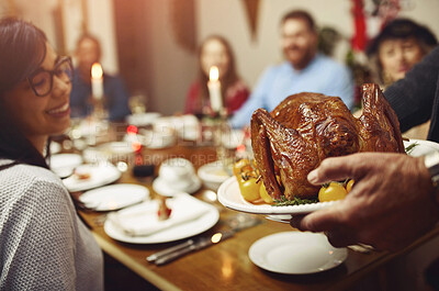 Buy stock photo Dinner, hands and plate with turkey chicken in home with happy people for thanksgiving. Family, feast and smile with food for gathering or event with love, support and unity for care in dining table