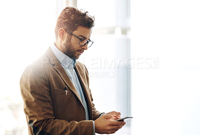 Buy stock photo Phone, social media and space with business man in office for communication, networking or text message. App, contact and email with professional employee reading information on mobile in workplace