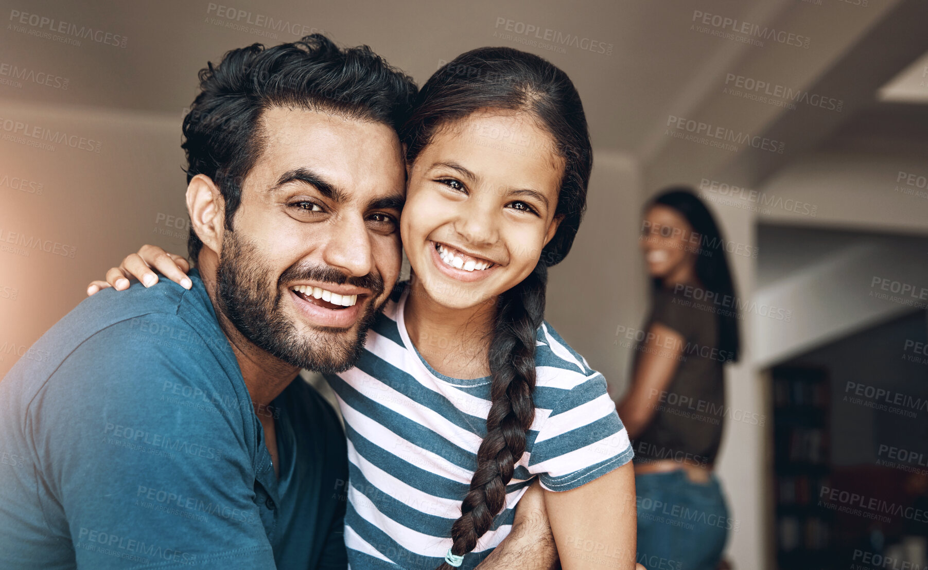 Buy stock photo Smile, portrait and father hug child for family bonding, care and connection in home together. Face, girl and dad embrace happy kid in house for support, trust and funny parents laughing for love