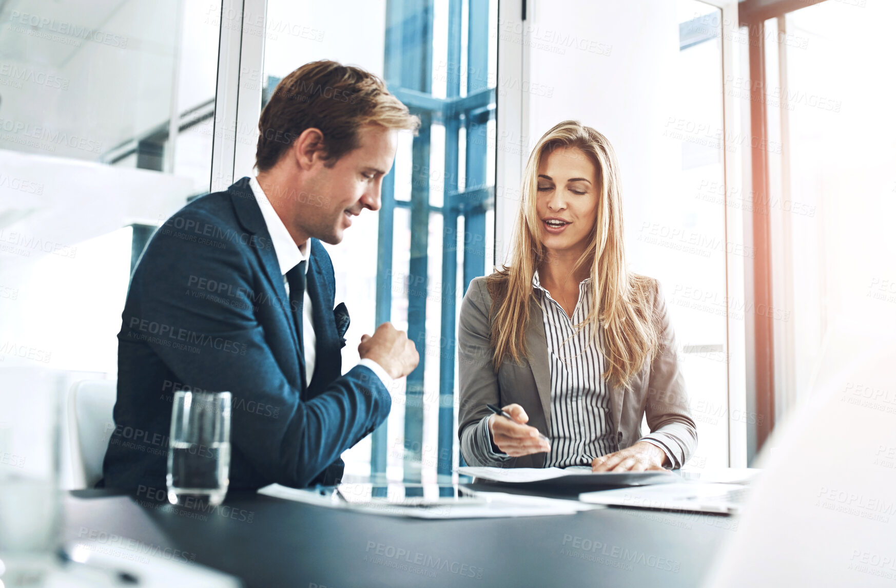 Buy stock photo Man, financial advisor and table with paperwork for discussion, contract or insurance agreement. Documents, consultation or female broker in office for investment, deal or meeting at desk with client