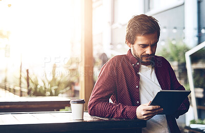 Buy stock photo Man, tablet and reading in morning at coffee shop with notification, contact or email on internet. Person, digital touchscreen and thinking with scroll, social media or web application in cafeteria