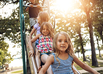 Buy stock photo Kids, park slide and portrait of group in summer to relax with friends on playground on vacation. Happy, holiday and children together for sunshine, games or smile outdoor at school recess or break