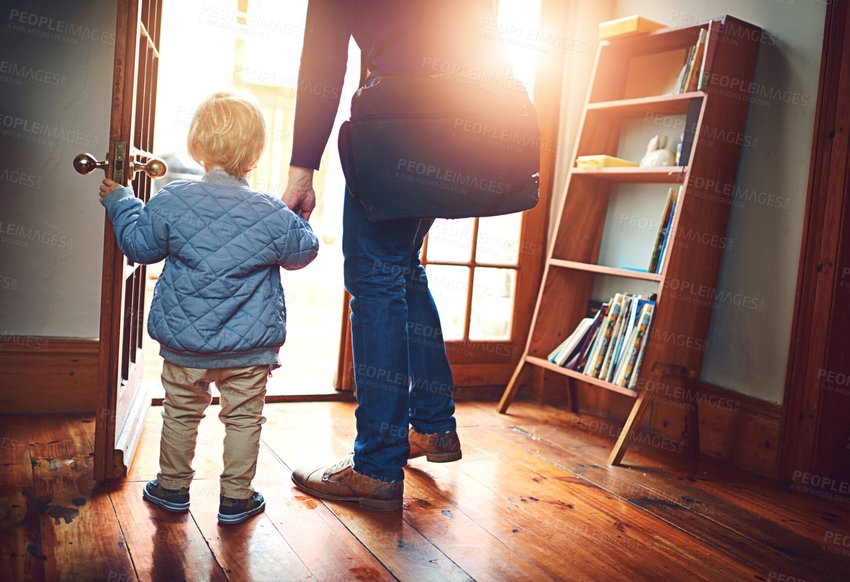 Buy stock photo Door, leaving or back with parent and child in home together for goodbye or start of morning. Entrance, family or holding hands with person and kid in apartment for travel to school or business