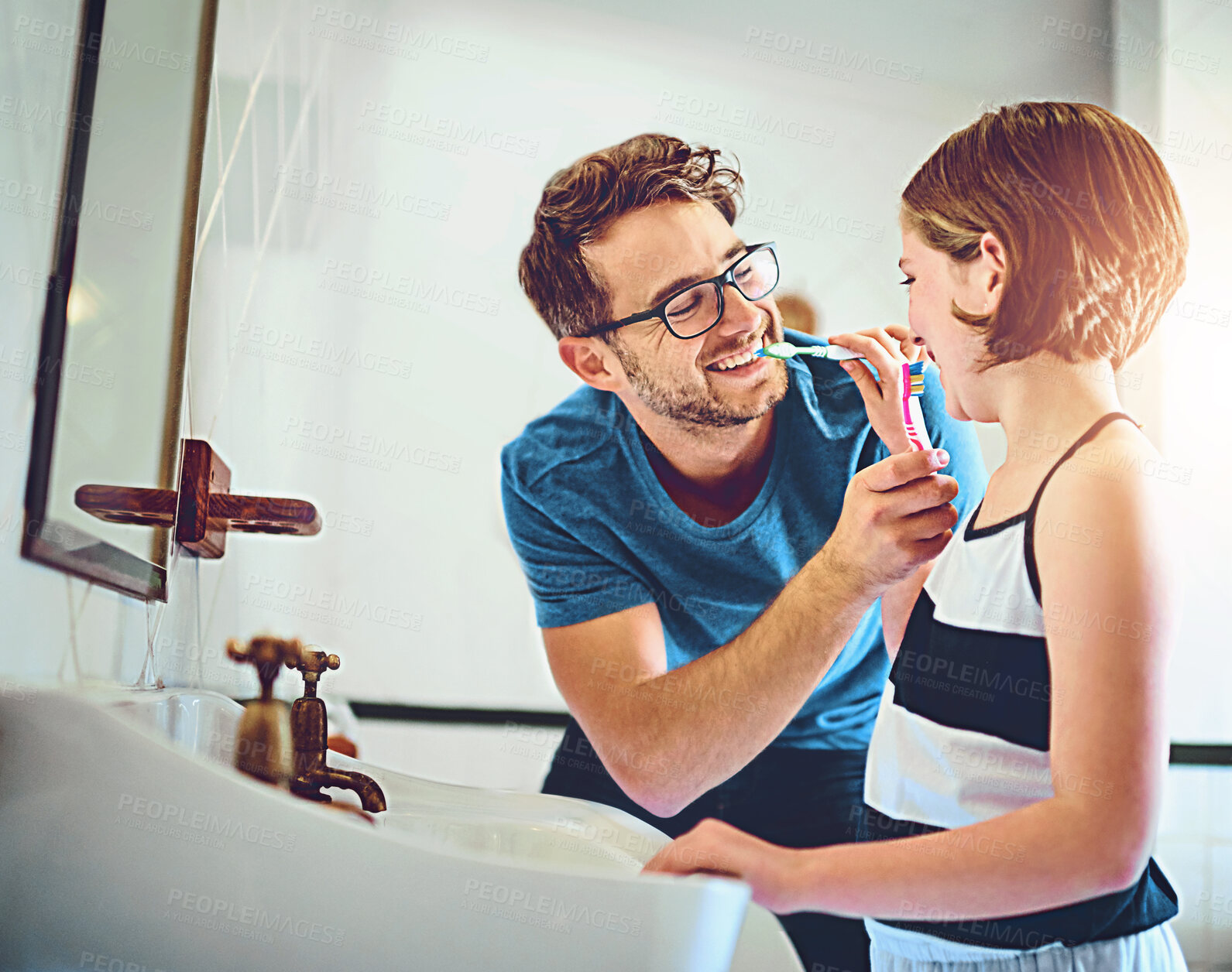 Buy stock photo Dental care, teaching and father brushing teeth with child for wellness, hygiene and morning routine. Bathroom, oral health and dad with girl kid for mouth cleaning treatment with toothbrush at home.