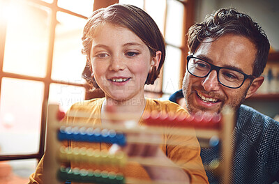 Buy stock photo Abacus, man and kid with smile for homeschool, learning and mathematics in living room. Help, dad and daughter at home for teaching, support and knowledge with tools for numbers, education and count