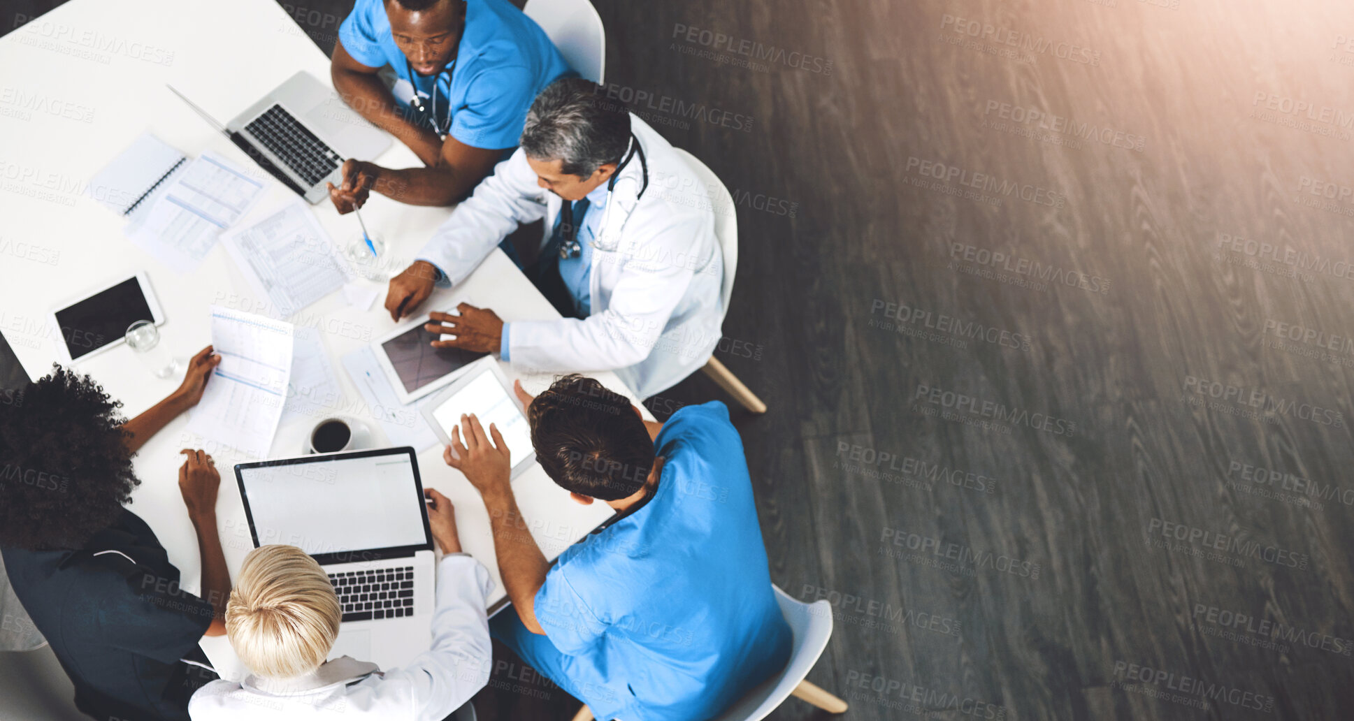 Buy stock photo Medical team, technology and meeting in office from above, paperwork and budget in hospital. Men, women and specialist at table for brainstorming, healthcare and financial planning in boardroom