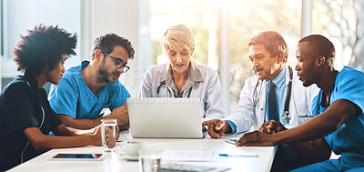 Buy stock photo Medical team, meeting and laptop in office for healthcare, discussion and expertise in hospital. Men, women and specialist at table for brainstorming, consulting and problem solving in boardroom