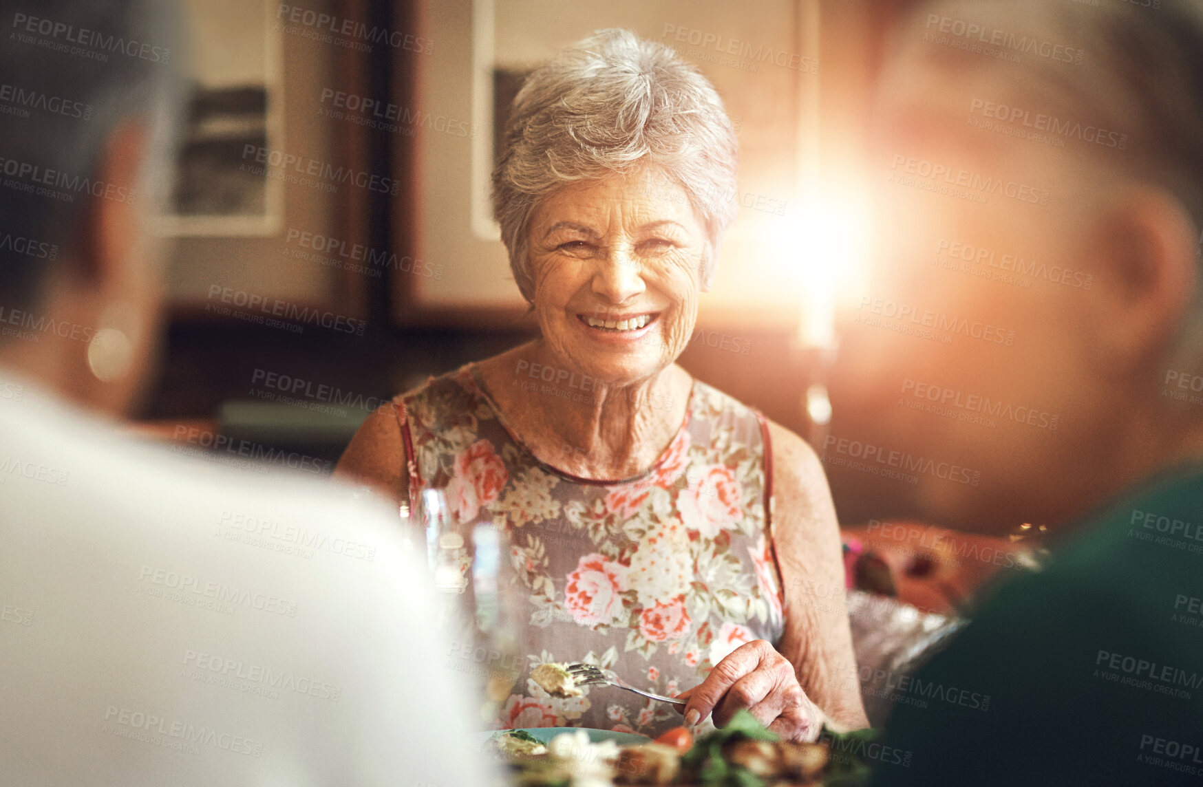 Buy stock photo Assisted living, happy and portrait of senior woman in retirement home with friends for social gathering. Face, relax or smile and elderly people in apartment together for dinner, hunger or meal