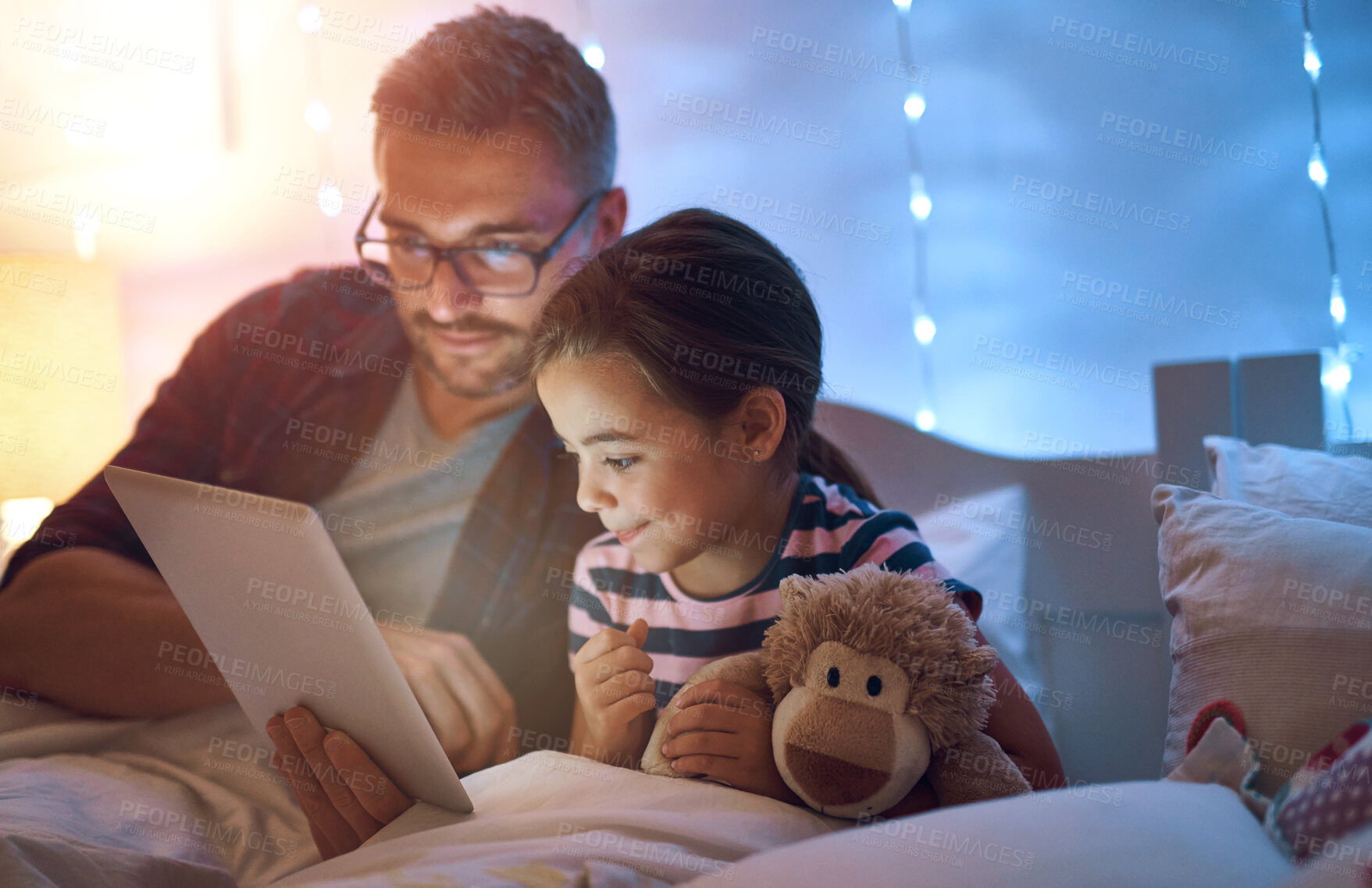 Buy stock photo Bedtime, storytelling on tablet with dad and daughter in bedroom of home together for bonding. Family, fantasy and smile with single parent reading to girl child in bed for relationship or relax