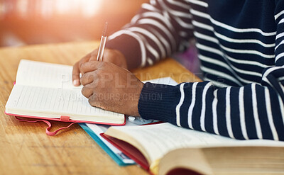 Buy stock photo Hands, student and writing with notebook in library for education, development and ready for exam. Person, books and pen for notes, scholarship and research in study hall for assessment at university