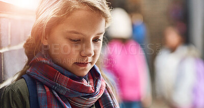 Buy stock photo Bullying, lonely and outcast with child student in hallway of school for depression or mental health. Anxiety, education and thinking with sad learner alone at school as victim of intimidation