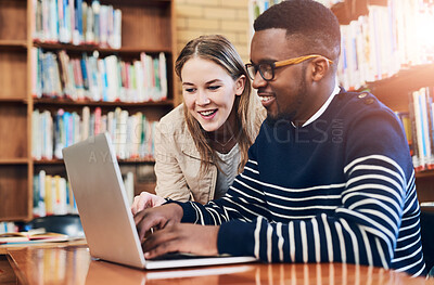 Buy stock photo People, students and laptop in library for research, education and exam preparation on campus. Man, woman and together with tech for studying, knowledge and learning on internet at university