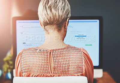 Buy stock photo Woman, back and online with computer in office for administrative work, digital reports and information management. Employee, internet and technology for schedule appointment and business software.