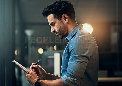 Buy stock photo Business, night and man with notebook, writing and thinking with planning for project, feedback and research. Evening, editor and journalist with pen, administration and review with ideas or solution