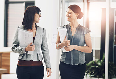 Buy stock photo Documents, discussion and business women in office planning for company investment with stocks. Conversation, paperwork and financial advisors walking with corporate revenue or profit growth report.