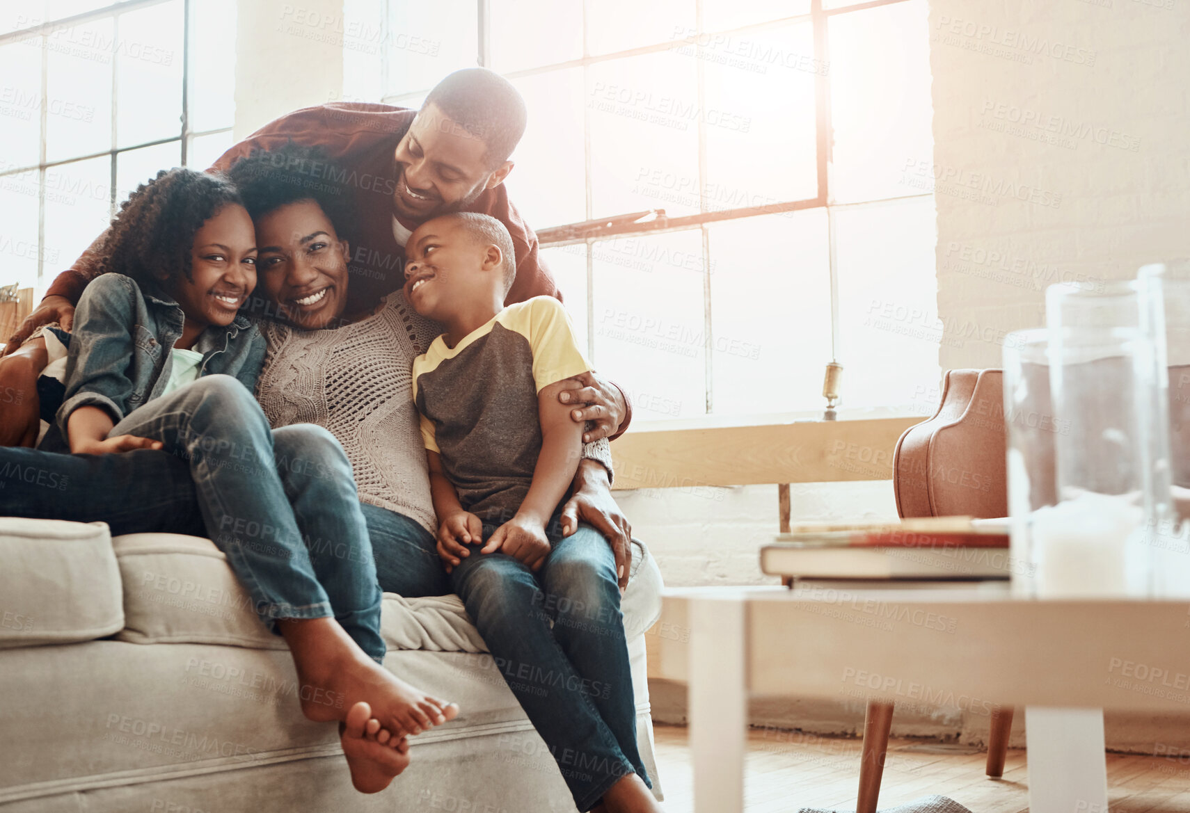 Buy stock photo Happy, portrait and black family on sofa in home for hugging, love and care on fathers day for celebration. Smile, bonding and African kids with mom and day relaxing together in living room at house.