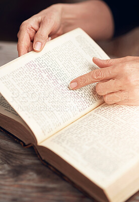 Buy stock photo Hands, person and reading bible with religion, peace and gratitude with faith, spiritual and praise. Closeup, believer and follower with holy book, guidance and personal growth with worship and home