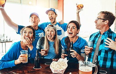 Buy stock photo Friends, excited people and watching tv at pub with sport, goal and game at restaurant with celebration. Fan group, smile and happy with drinks, live broadcast and match together at bar with alcohol