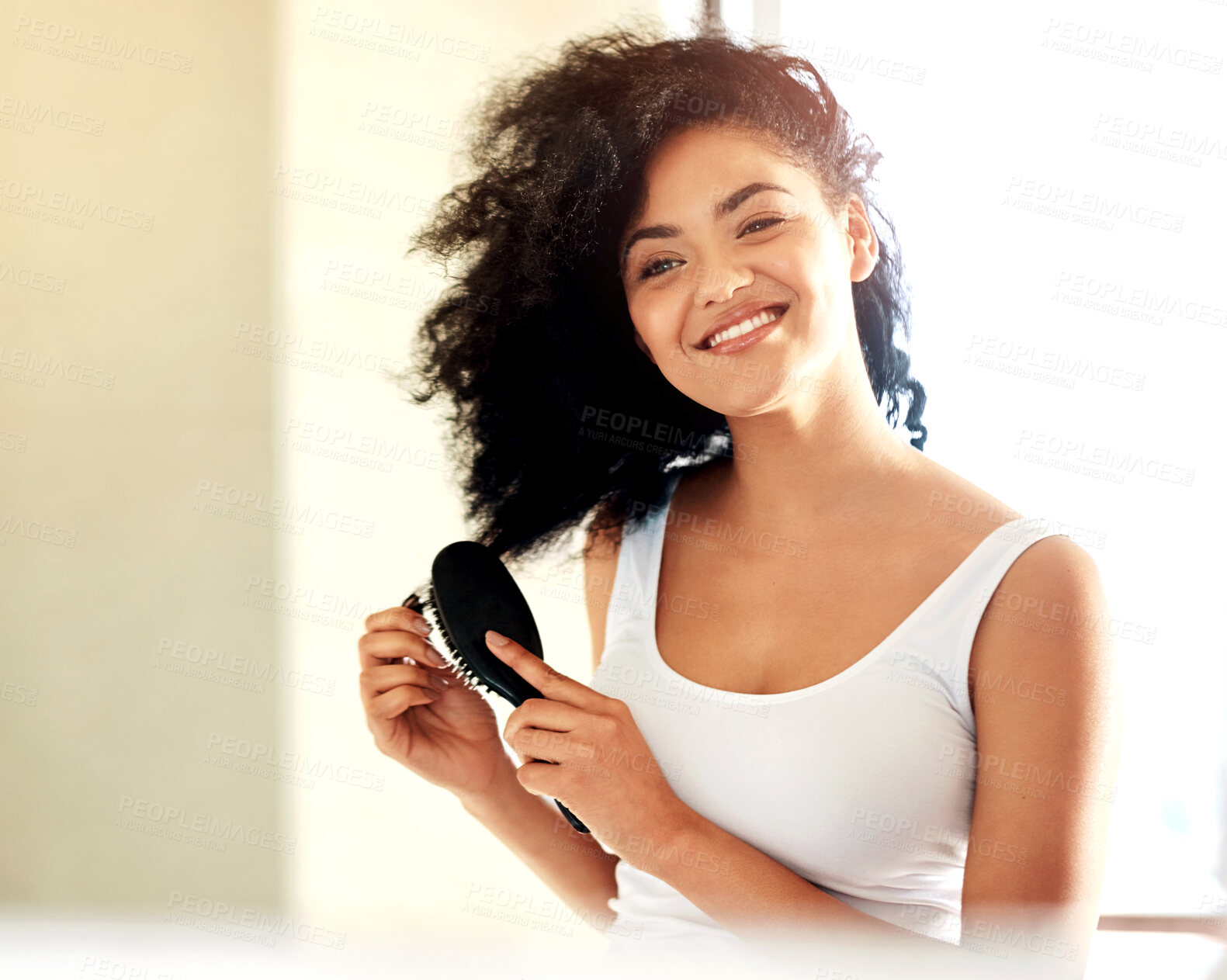 Buy stock photo Hair care, woman and happy with afro for beauty, morning routine and getting ready with hairbrush in bathroom. Person, face and smile with shampoo shine, cosmetics or dermatology for wellness in home